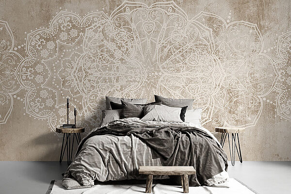 Motif orné blanc sur une surface brune Motif orné blanc sur une surface brune
