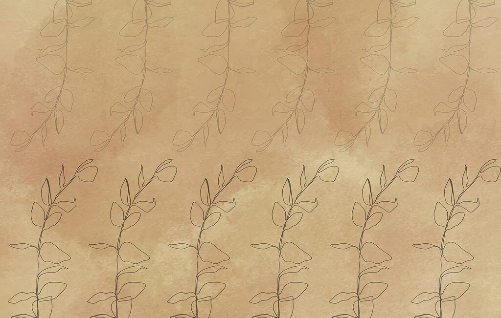 Motif de feuilles sur une surface brune Motif de feuilles sur une surface brune