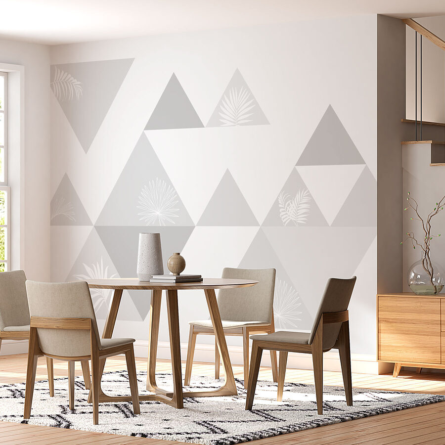 Triangles blancs et gris avec un motif de feuilles