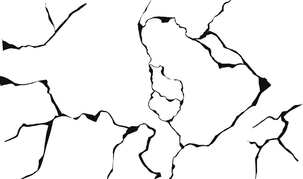 Dessin en noir et blanc d'une surface fissurée Dessin en noir et blanc d'une surface fissurée