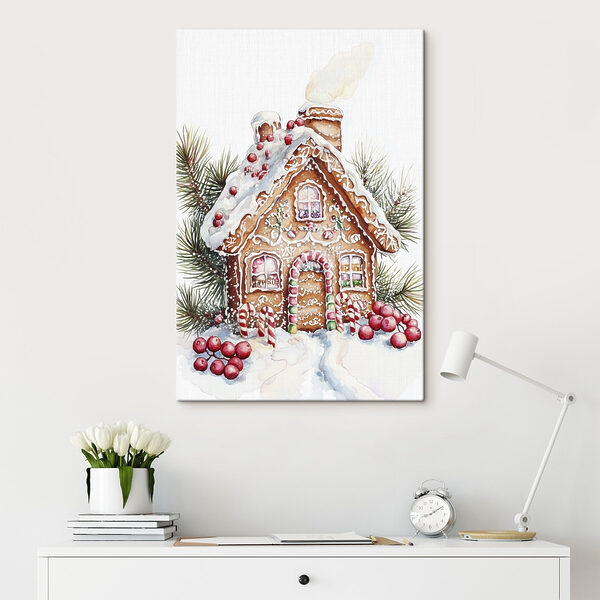 Maison en pain d'épices avec cannes à sucre et branches de pin Maison en pain d'épices avec cannes à sucre et branches de pin