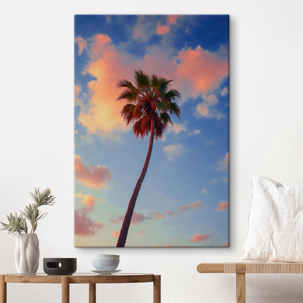 Palm tree with blue sky and clouds