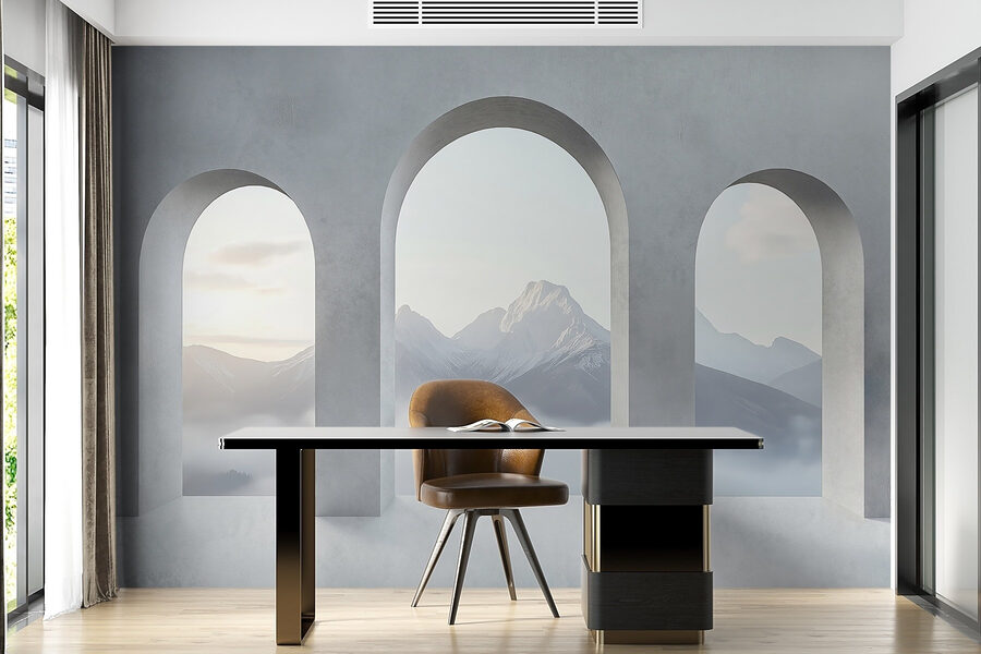 Chambre blanche avec fenêtres cintrées et montagnes en arrière-plan