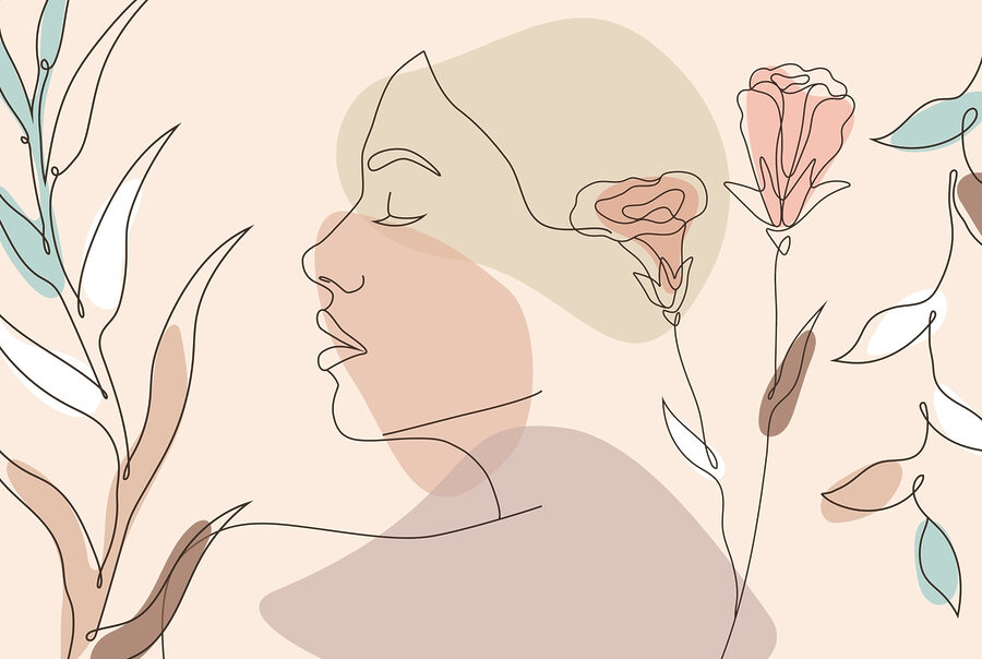 Visage de femme avec des fleurs