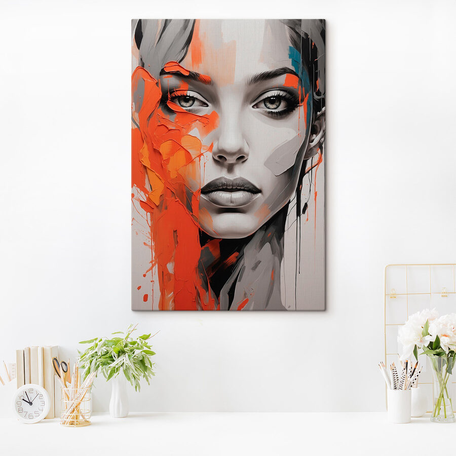 Peinture d'une femme avec de la peinture orange sur le visage Peinture d'une femme avec de la peinture orange sur le visage
