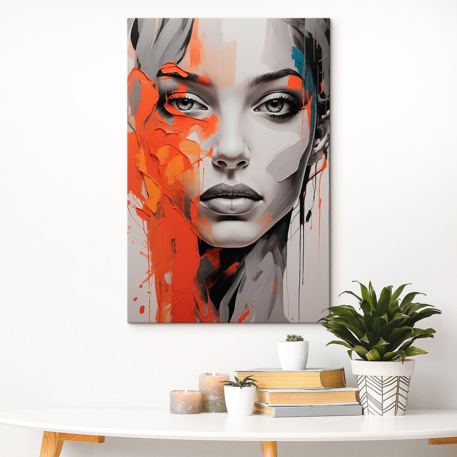 Peinture d'une femme avec de la peinture orange sur le visage Peinture d'une femme avec de la peinture orange sur le visage