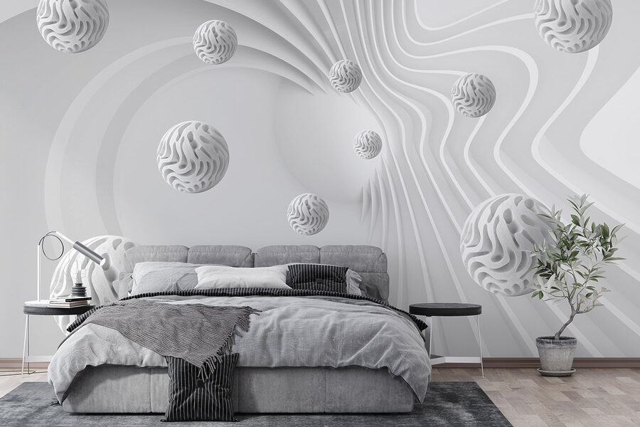Surface blanche tourbillonnante avec des boules blanches