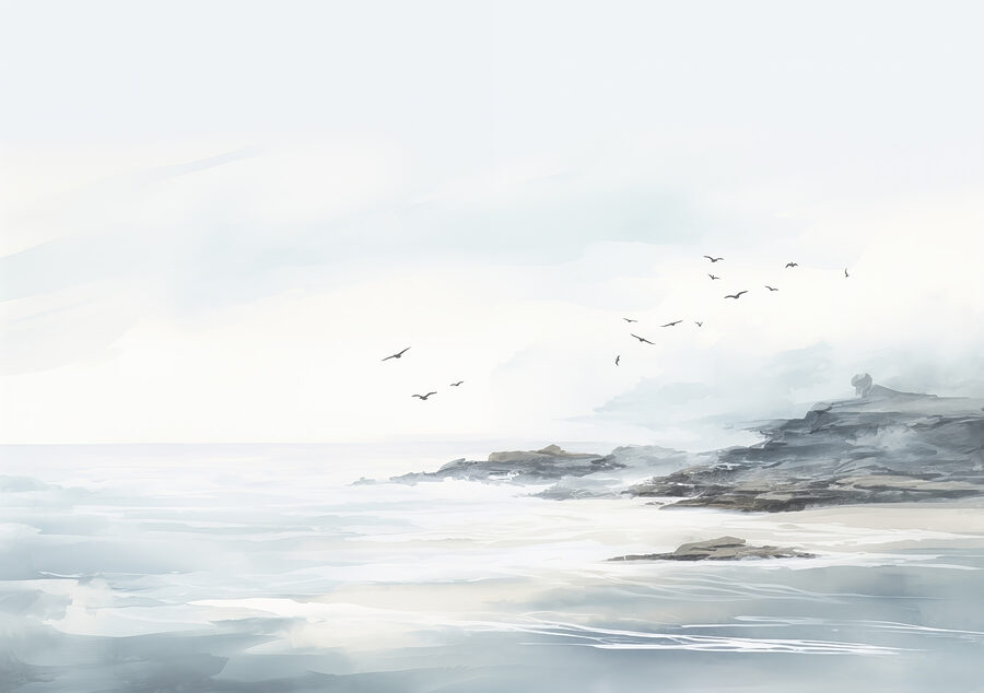 Oiseaux volant au-dessus d'une plage rocheuse