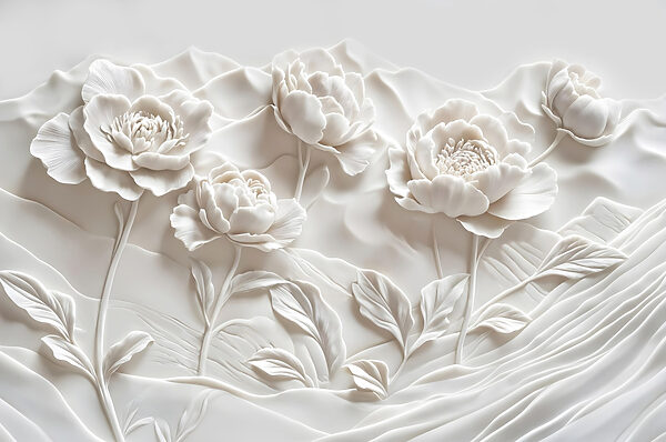 Sculpture de fleurs blanches sur un mur Sculpture de fleurs blanches sur un mur