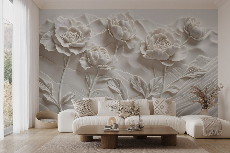 Sculpture de fleurs blanches sur un mur