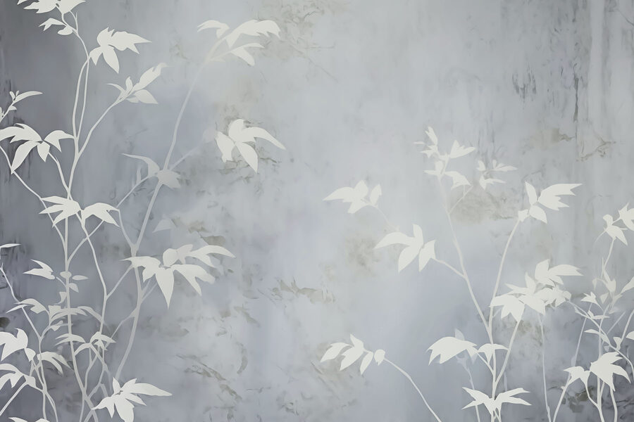 Feuilles blanches sur une surface grise