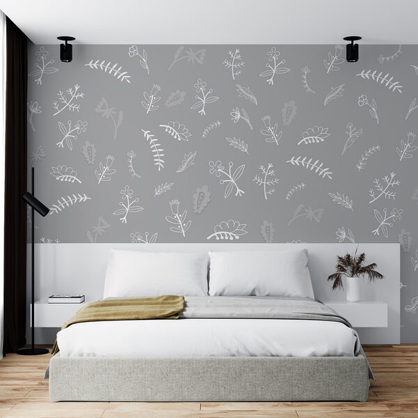 Fond gris avec des fleurs et des feuilles blanches Fond gris avec des fleurs et des feuilles blanches