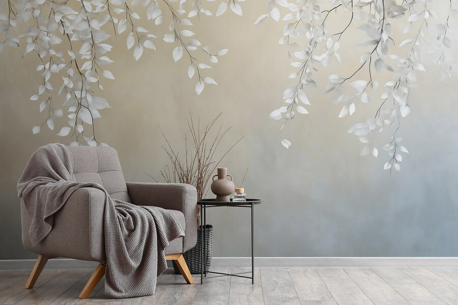 Feuilles blanches sur une branche