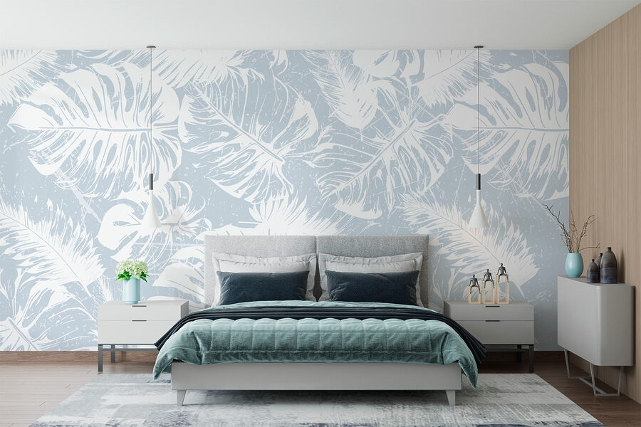 Feuilles blanches sur fond bleu