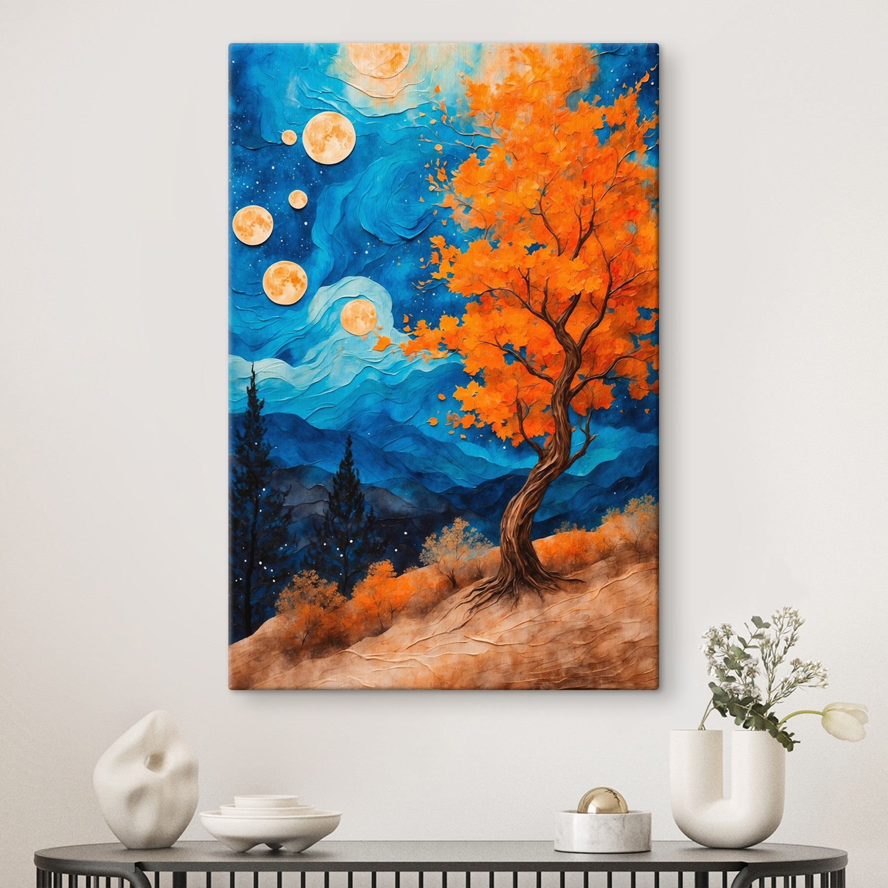 Painting of a tree with orange leaves and blue mountains Painting of a tree with orange leaves and blue mountains
