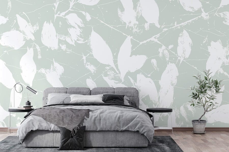 Feuilles blanches sur fond vert clair