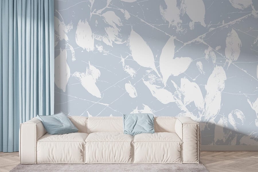 Feuilles blanches sur fond bleu