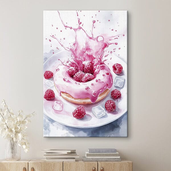 Donut avec glaçage rose et framboises éclaboussant une assiette blanche Donut avec glaçage rose et framboises éclaboussant une assiette blanche