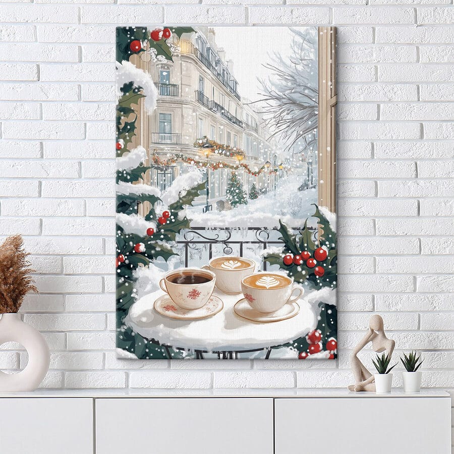 Tableaux Deux tasses de café sur un balcon avec de la neige et des bâtiments