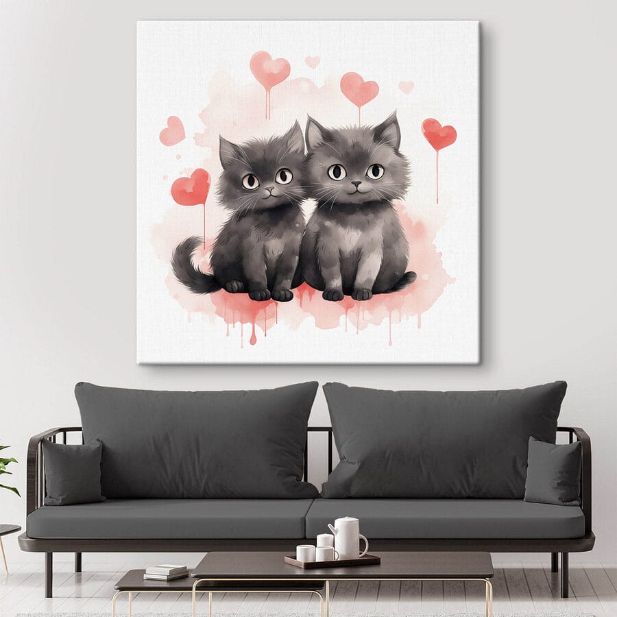 Deux chats assis l'un à côté de l'autre Deux chats assis l'un à côté de l'autre