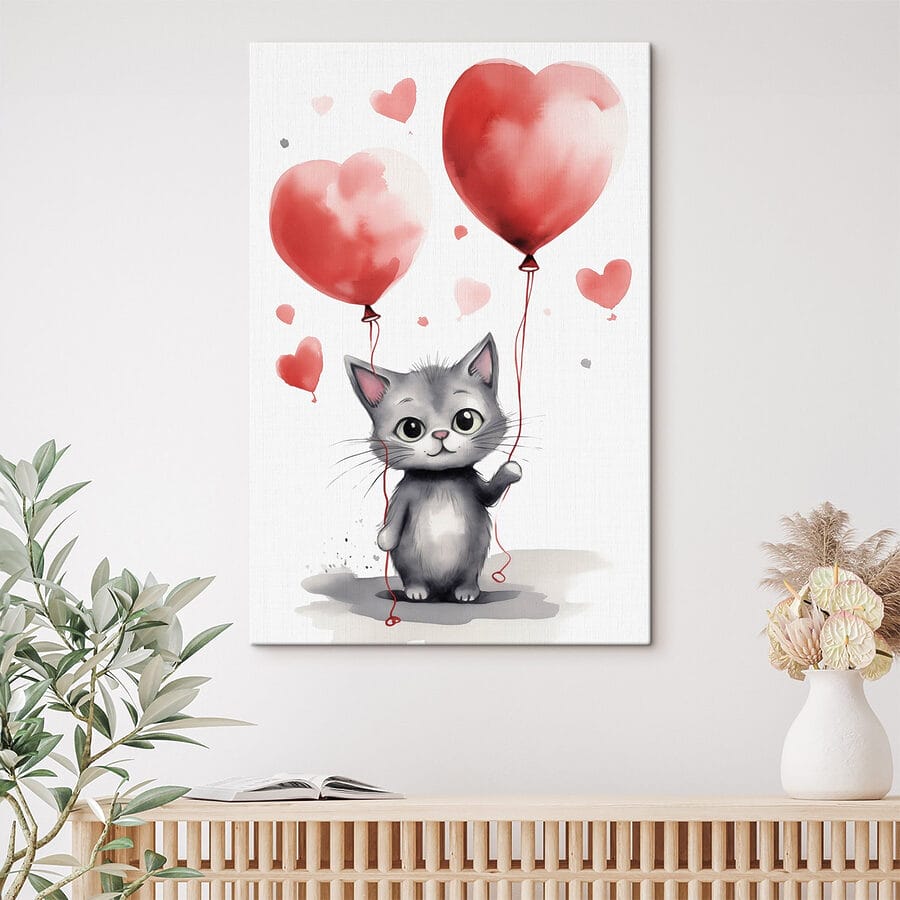 Chat tenant des ballons
