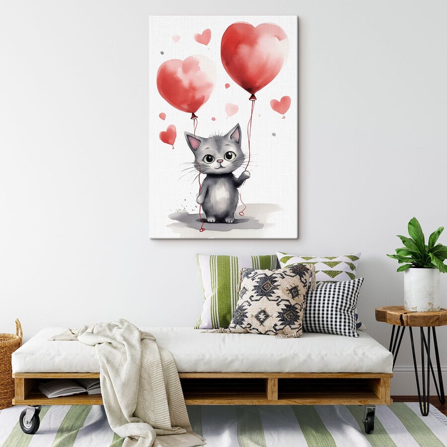 Chat tenant des ballons