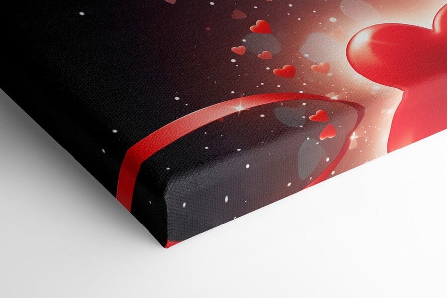 Deux cœurs avec des rubans rouges et des lumières