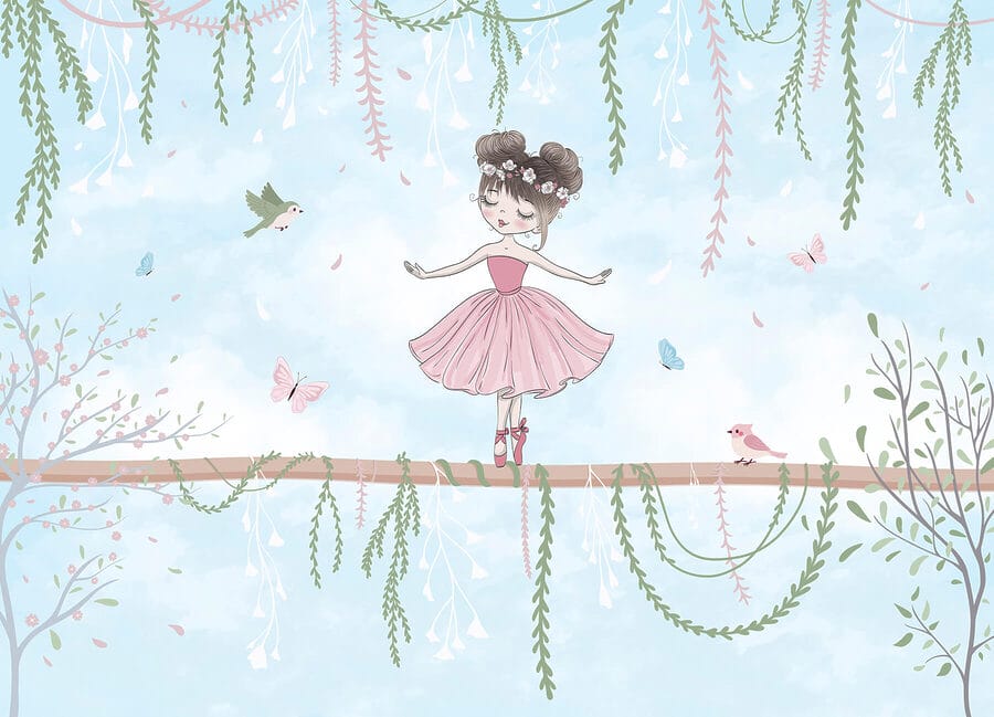 Fille en robe rose sur une branche