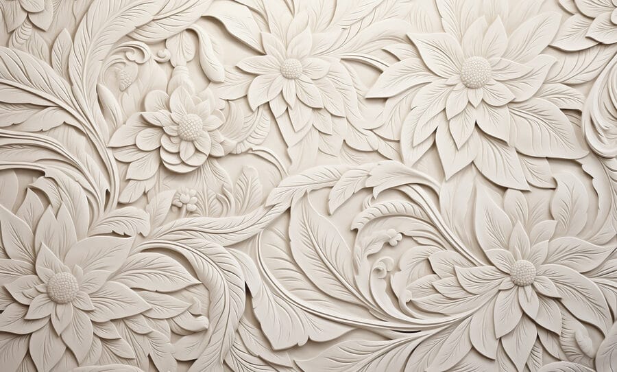 Mur blanc avec fleurs et feuilles