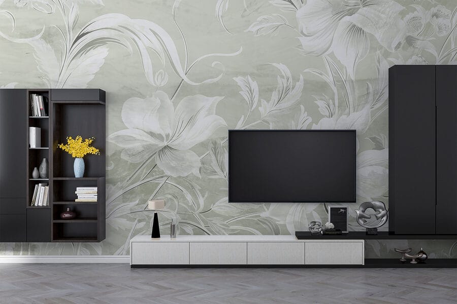 Motif floral blanc sur un mur