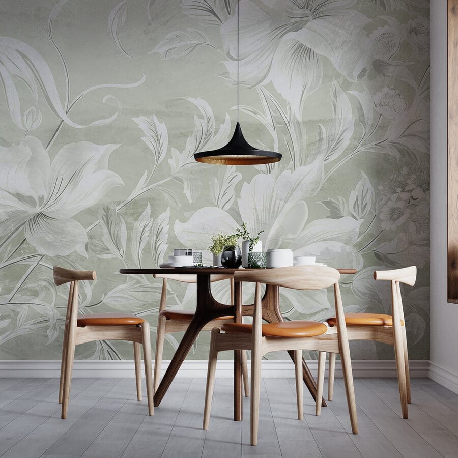 Motif floral blanc sur un mur