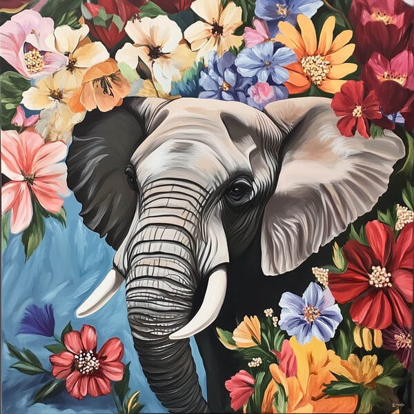 Un éléphant avec des défenses dans un jardin de fleurs Un éléphant avec des défenses dans un jardin de fleurs