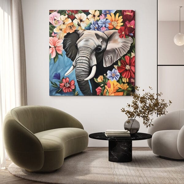 Un éléphant avec des défenses dans un jardin de fleurs Un éléphant avec des défenses dans un jardin de fleurs