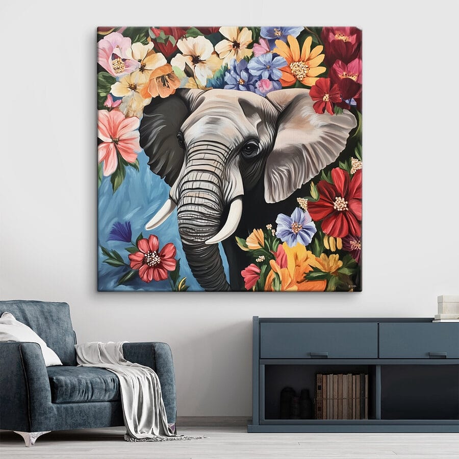 Un éléphant avec des défenses dans un jardin de fleurs Un éléphant avec des défenses dans un jardin de fleurs