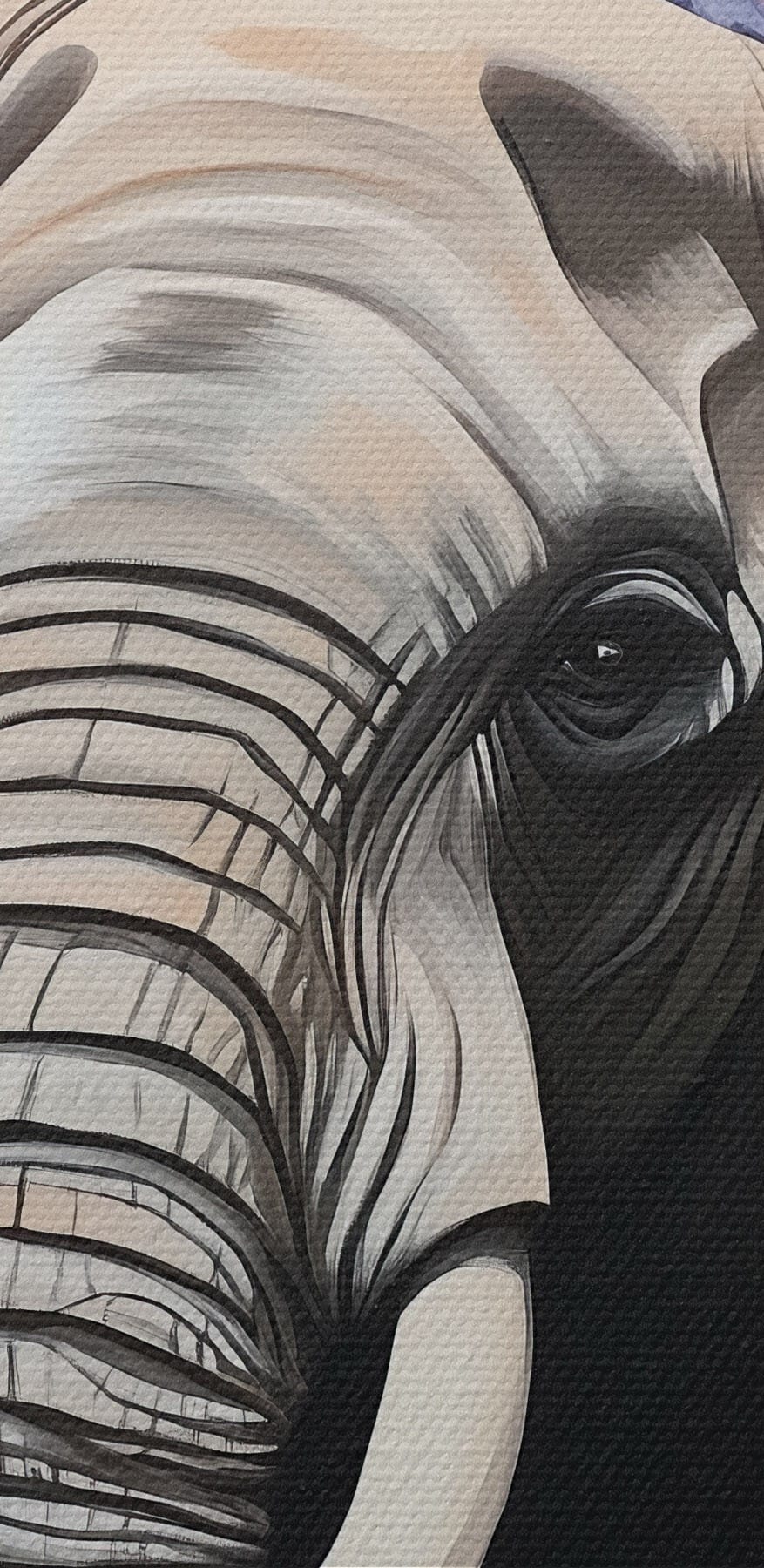 Un éléphant avec des défenses dans un jardin de fleurs Un éléphant avec des défenses dans un jardin de fleurs