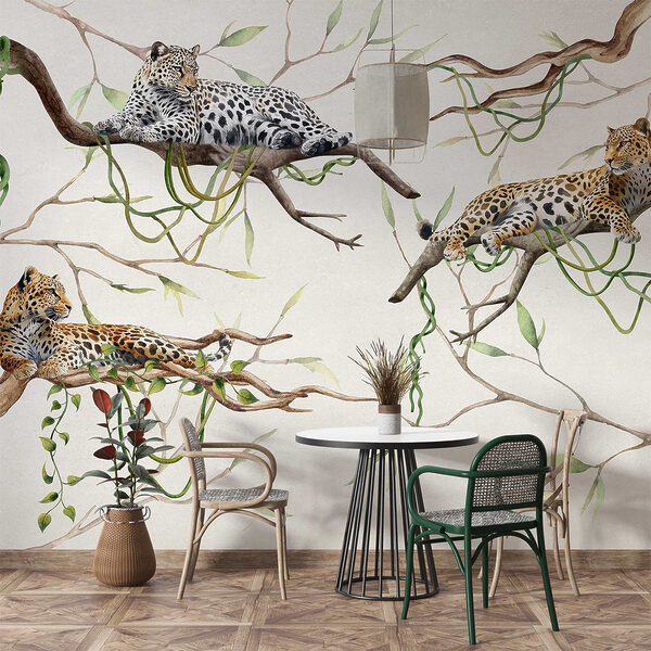 Groupe de léopards couchés sur des branches Groupe de léopards couchés sur des branches
