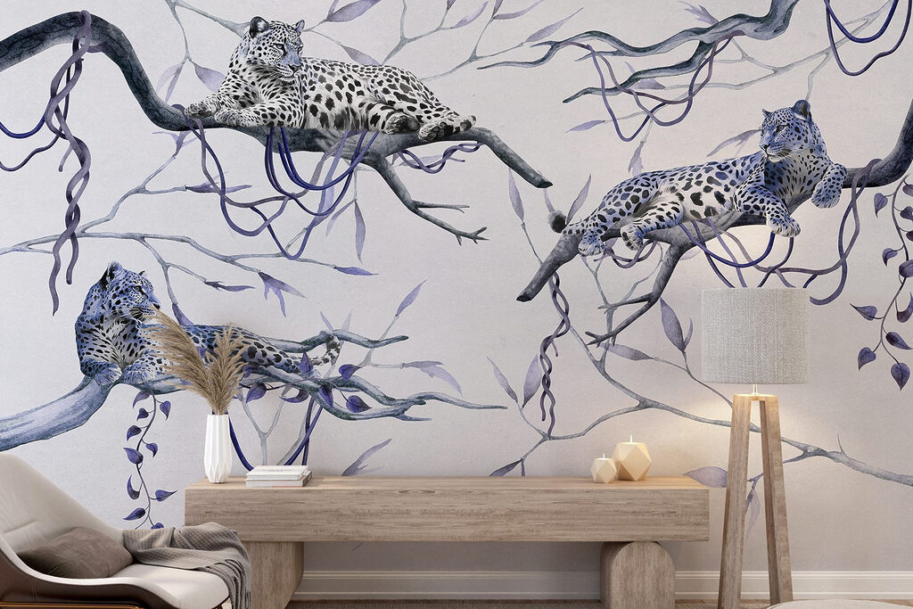 Group of leopards lying on branches