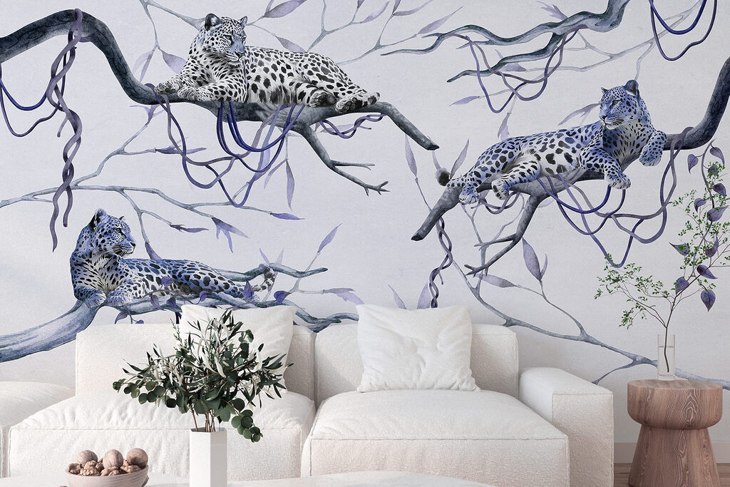 Group of leopards lying on branches