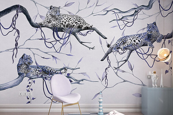 Groupe de léopards couchés sur des branches Groupe de léopards couchés sur des branches