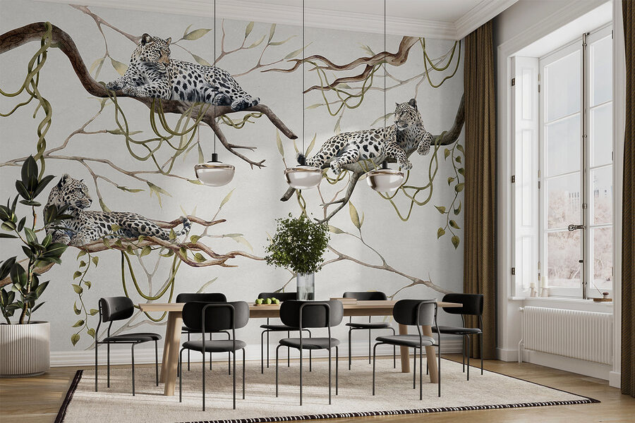 Groupe de léopards couchés sur des branches Groupe de léopards couchés sur des branches
