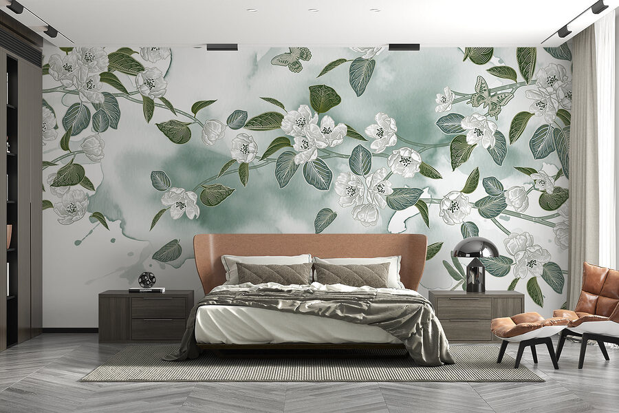 Fleurs blanches et feuilles vertes sur fond blanc