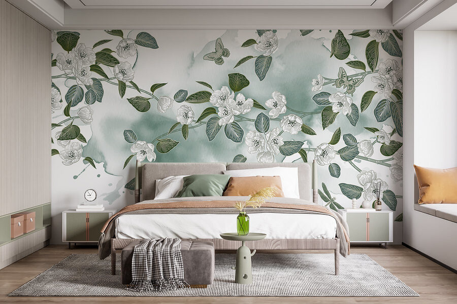 Fleurs blanches et feuilles vertes sur fond blanc