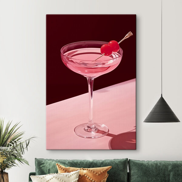 Verre avec un liquide rose et deux cerises dessus Verre avec un liquide rose et deux cerises dessus