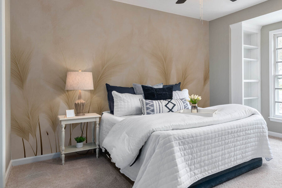Groupe de plumes sur fond beige