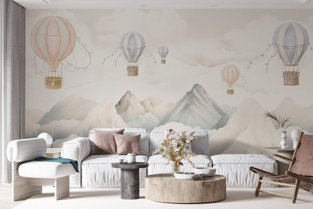 Group of hot air balloons in the sky above mountains
