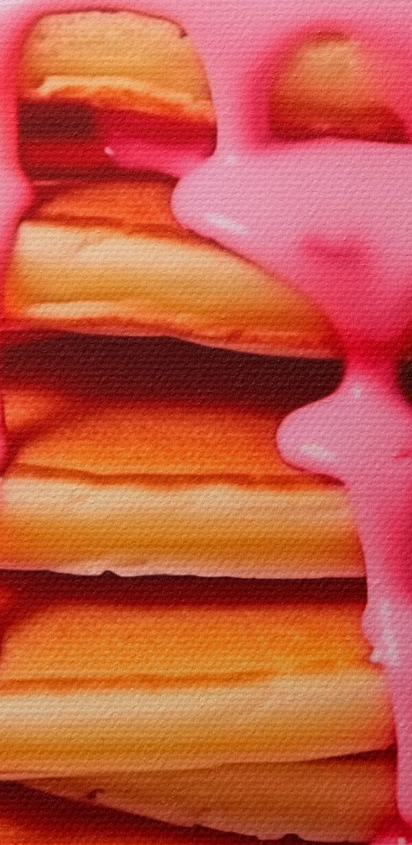 Stack of pancakes with pink frosting and strawberries Stack of pancakes with pink frosting and strawberries