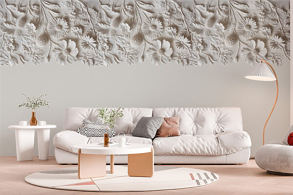 Motif floral blanc sur un mur Motif floral blanc sur un mur