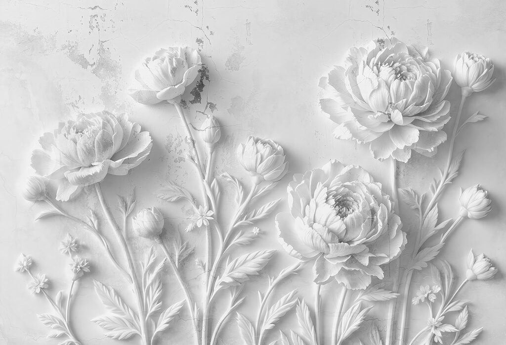 Sculpture de fleurs blanches sur un mur Sculpture de fleurs blanches sur un mur