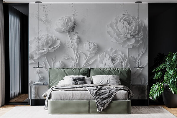 Sculpture de fleurs blanches sur un mur Sculpture de fleurs blanches sur un mur