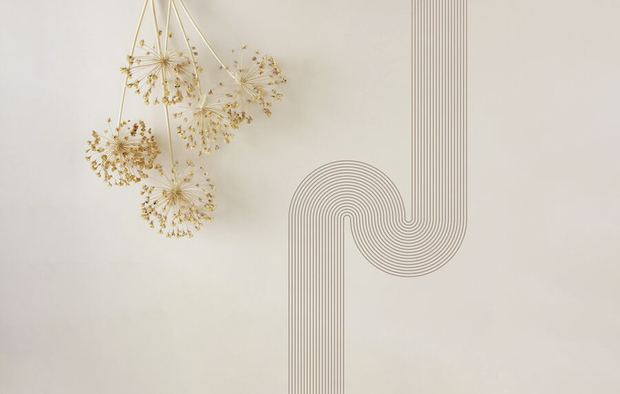 Mur avec un bouquet de pissenlits